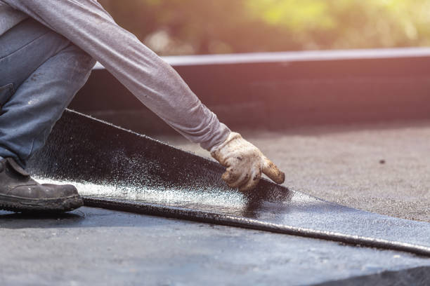 Professional Basement Waterproofing technician working in Arnold, MD